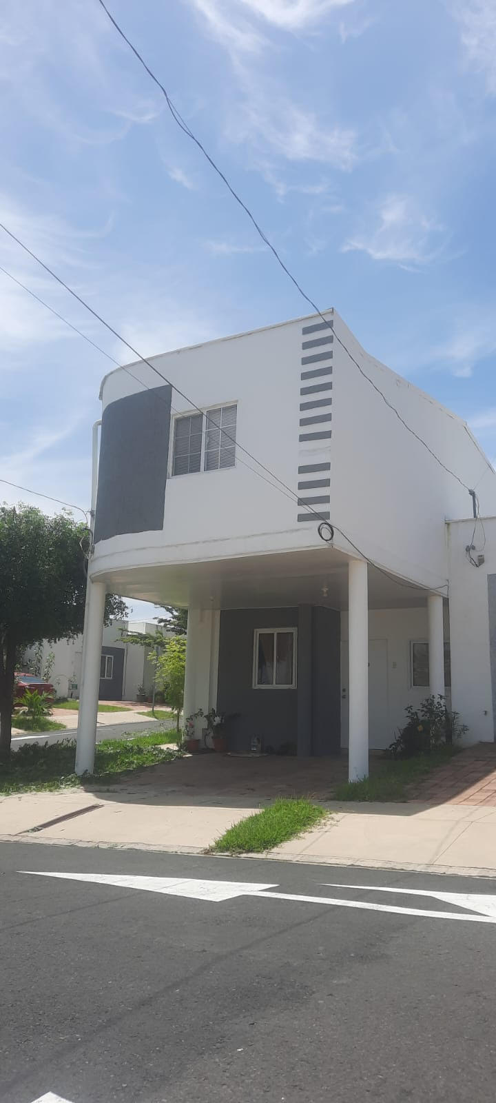 Corner House with Solar Panels in Ciudad Marsella – Opico, El Salvador